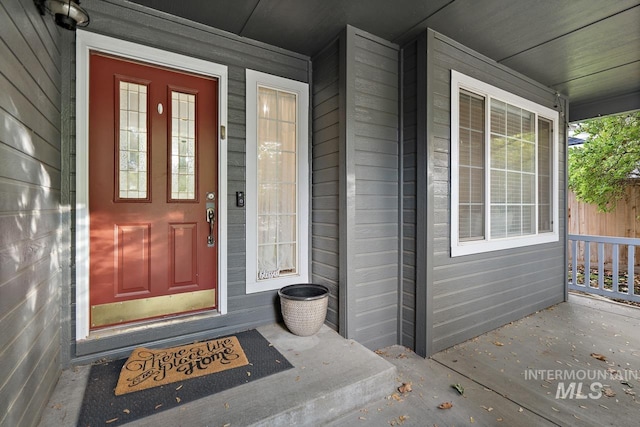 entrance to property with covered porch