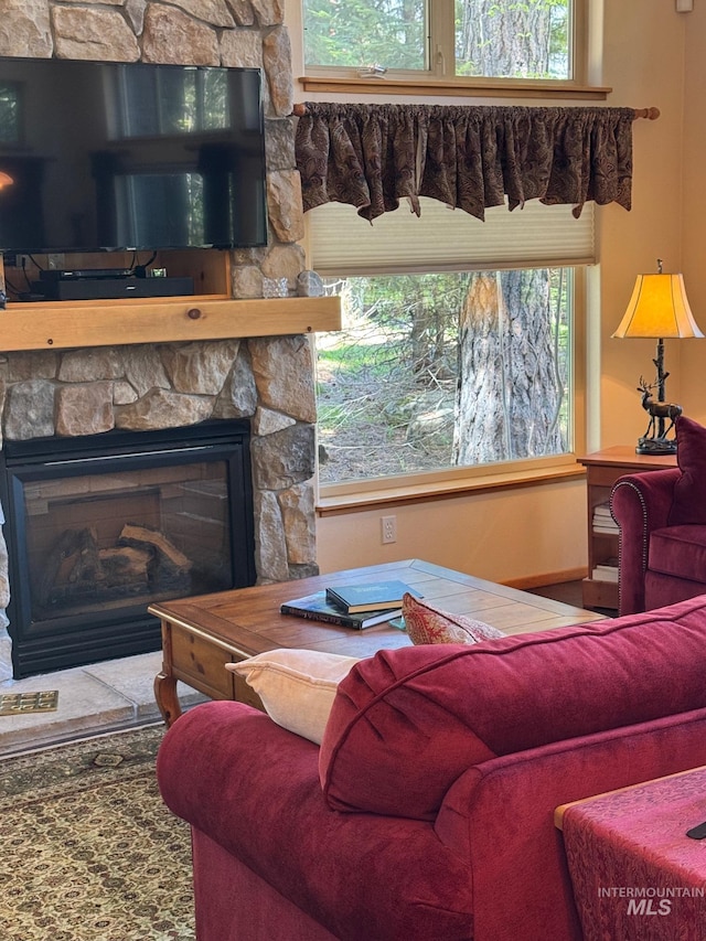 1013 Penstemen Pl, Mccall, ID 83638 - living room featuring a stone fireplace