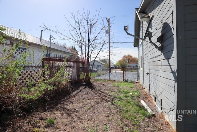 view of yard featuring fence