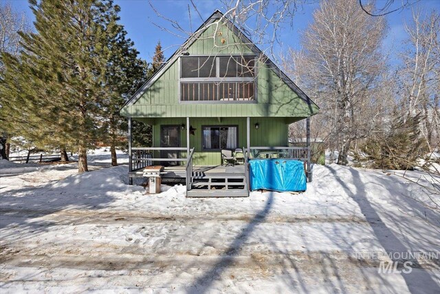 186 Phillips Creek Ln, Fairfield, ID 83327 - snow covered house featuring a wooden deck