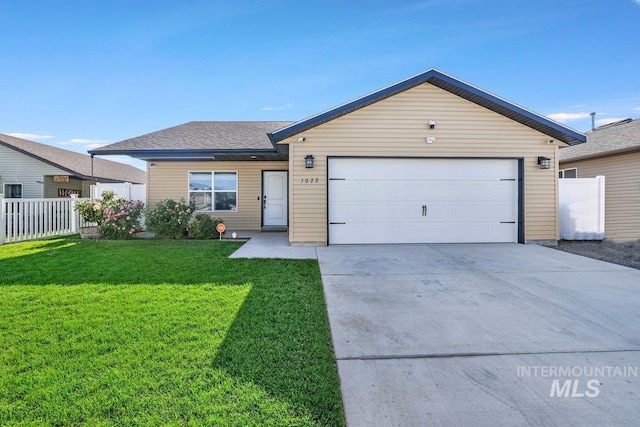 1022 S Date St, Jerome, ID 83338 - ranch-style house featuring concrete driveway and an attached garage