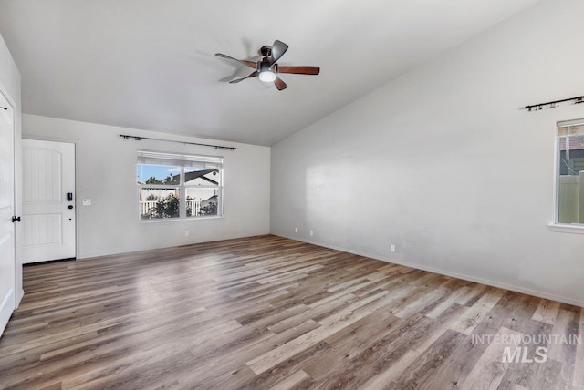 1022 S Date St, Jerome, ID 83338 - unfurnished room featuring lofted ceiling, ceiling fan, and wood finished floors