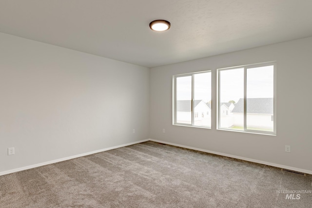 view of carpeted spare room