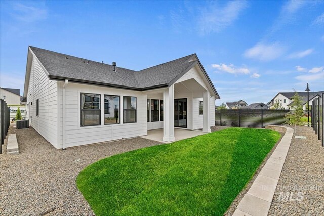 7680 W Old School St, Meridian, ID 83646 - back of property featuring central AC unit, a patio, and roof with shingles