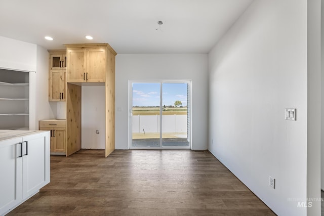 1012 23rd Ave E, Jerome, ID 83338 - kitchen featuring recessed lighting, glass insert cabinets, light brown cabinetry, light countertops, and wood finished floors
