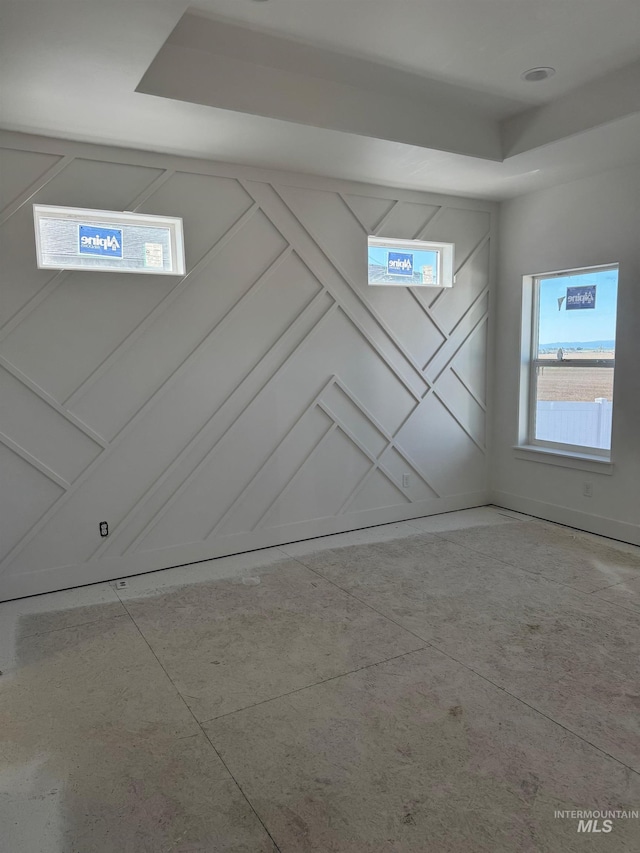 1012 23rd Ave E, Jerome, ID 83338 - unfurnished room with a tray ceiling