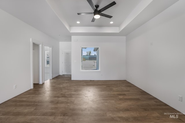 1012 23rd Ave E, Jerome, ID 83338 - unfurnished room featuring wood finished floors, a tray ceiling, a ceiling fan, and recessed lighting