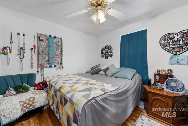 722 Nevada St, Gooding, ID 83330 - bedroom with wood finished floors and ceiling fan