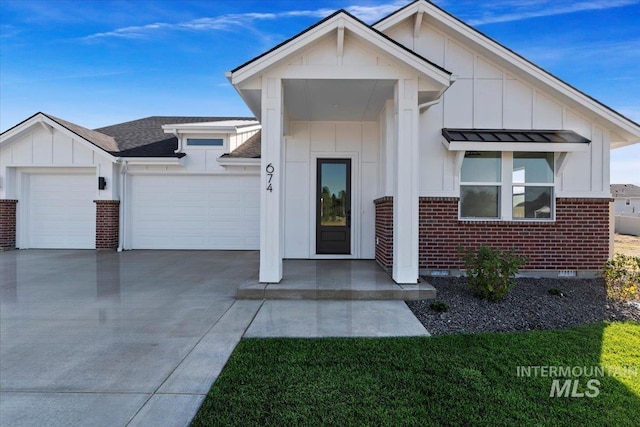 view of front of property with a garage