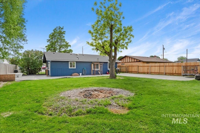 107 Nogales, Caldwell, ID 83605 - rear view of house featuring a patio area