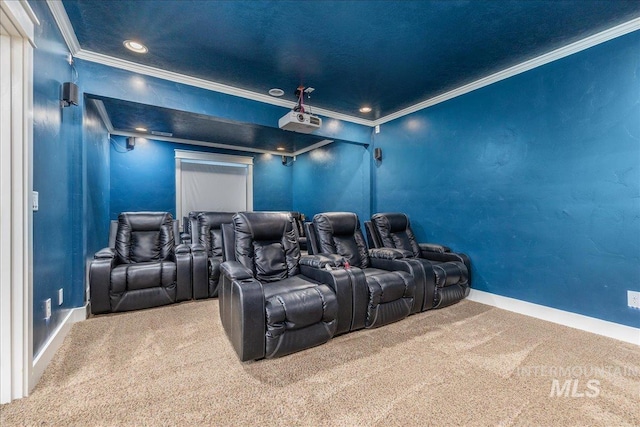 carpeted home theater featuring crown molding, recessed lighting, and baseboards