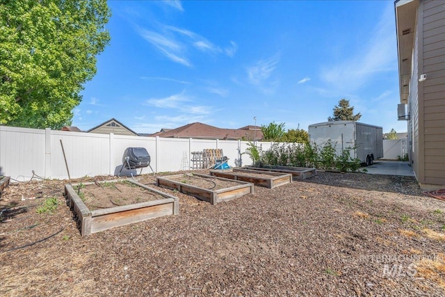 view of yard featuring a garden and fence
