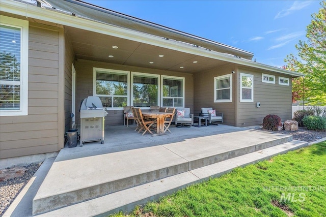 back of house featuring a patio area
