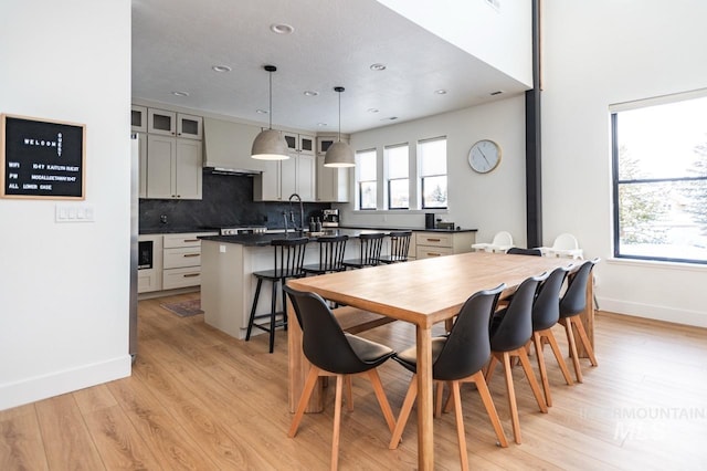 1047 Kaitlyn Loop, Mccall, ID 83638 - dining area featuring light wood-type flooring, baseboards, and recessed lighting