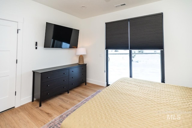 1047 Kaitlyn Loop, Mccall, ID 83638 - bedroom with light wood-type flooring and baseboards