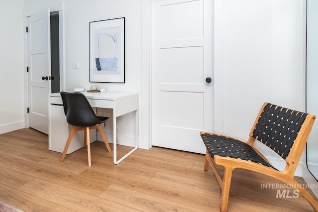 1047 Kaitlyn Loop, Mccall, ID 83638 - office area featuring light wood-type flooring and baseboards