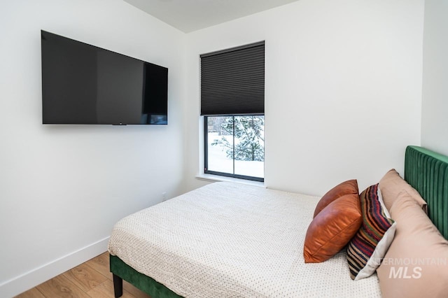 1047 Kaitlyn Loop, Mccall, ID 83638 - bedroom with wood finished floors and baseboards