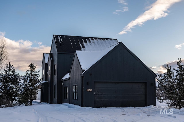 1047 Kaitlyn Loop, Mccall, ID 83638 - view of front of house with a garage