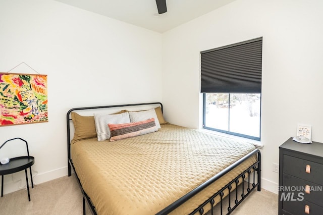 1047 Kaitlyn Loop, Mccall, ID 83638 - bedroom featuring light colored carpet, baseboards, and ceiling fan