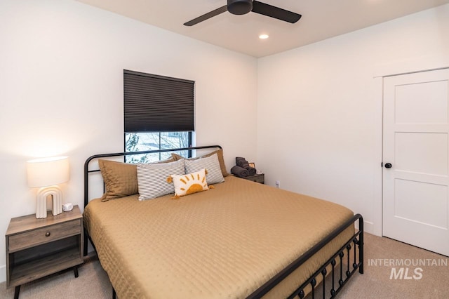 1047 Kaitlyn Loop, Mccall, ID 83638 - bedroom with light colored carpet, recessed lighting, and a ceiling fan