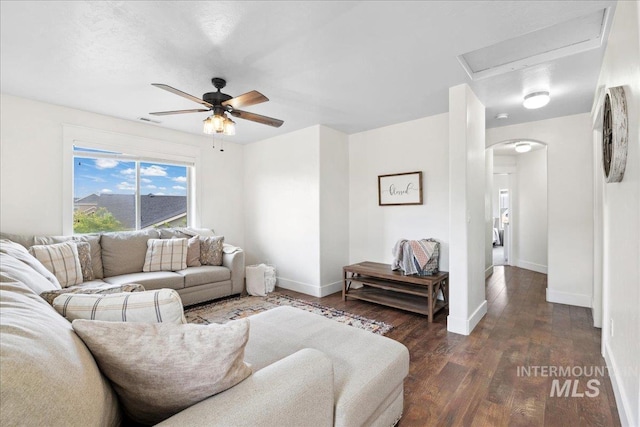1041 White Horse Ridge Dr, Middleton, ID 83644 - living room with ceiling fan, wood finished floors, baseboards, and attic access