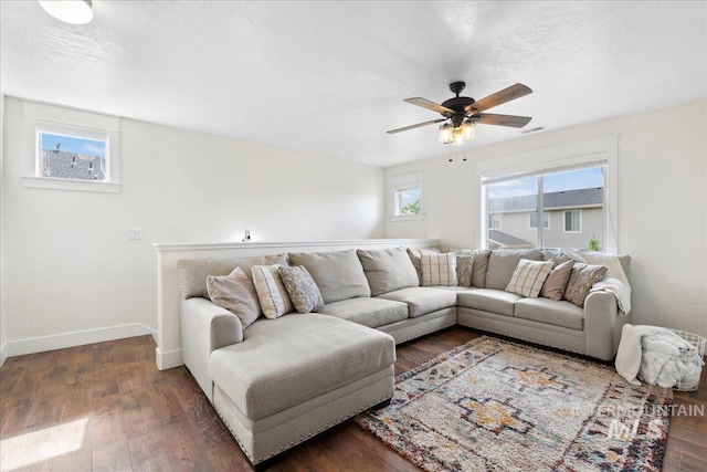 1041 White Horse Ridge Dr, Middleton, ID 83644 - living room featuring ceiling fan, wood finished floors, and baseboards