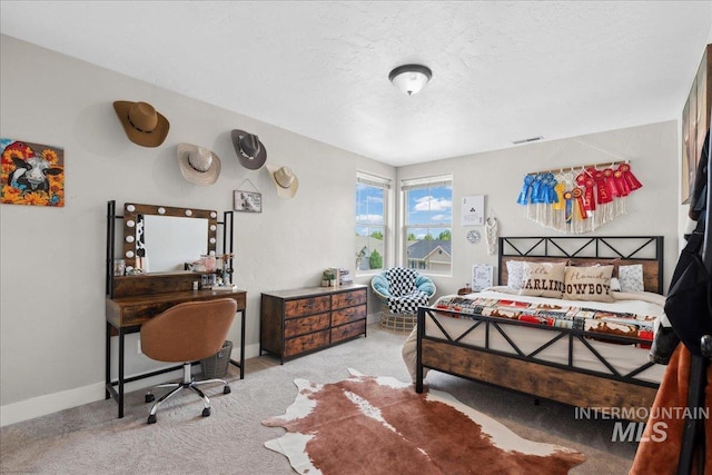 1041 White Horse Ridge Dr, Middleton, ID 83644 - carpeted bedroom featuring baseboards and a textured ceiling