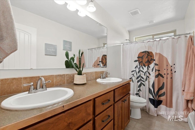 1041 White Horse Ridge Dr, Middleton, ID 83644 - full bath featuring double vanity, toilet, a shower with curtain, and tile patterned flooring