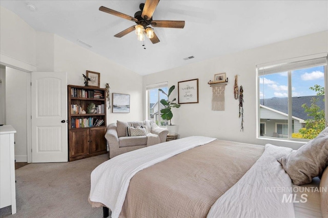 1041 White Horse Ridge Dr, Middleton, ID 83644 - bedroom featuring carpet floors, multiple windows, vaulted ceiling, and ceiling fan