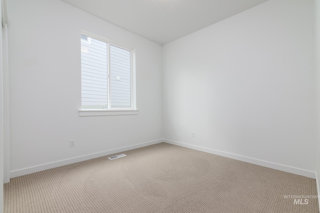 empty room with carpet floors