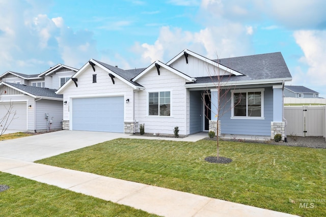 view of front facade with a garage and a front yard