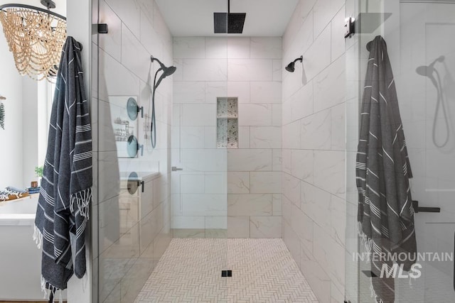 5251 Hidden Hollow Ln, Emmett, ID 83617 - full bathroom with a shower stall and a chandelier