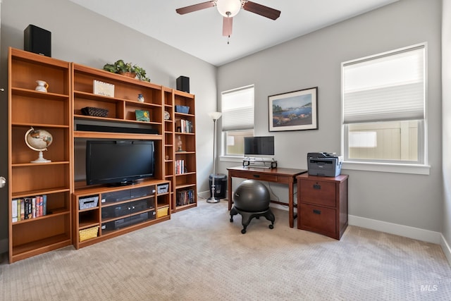 office area featuring baseboards, carpet, and ceiling fan