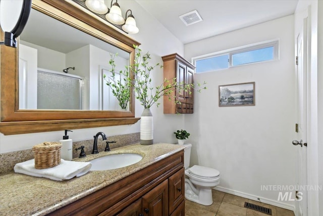 full bathroom featuring an enclosed shower, visible vents, tile patterned floors, and vanity