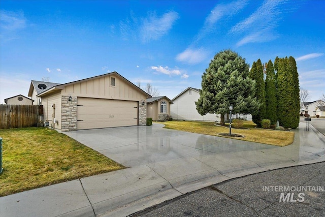 single story home featuring driveway, board and batten siding, a front lawn, and fence