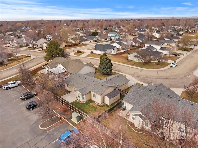 birds eye view of property with a residential view