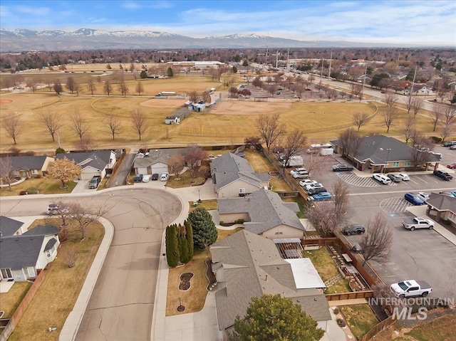 bird's eye view with a mountain view and a residential view