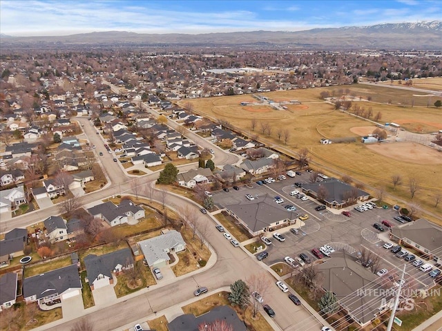 aerial view featuring a residential view and a mountain view