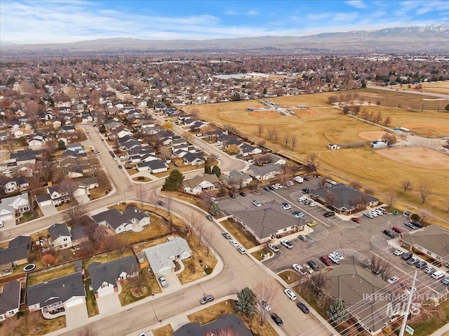 aerial view with a mountain view and a residential view