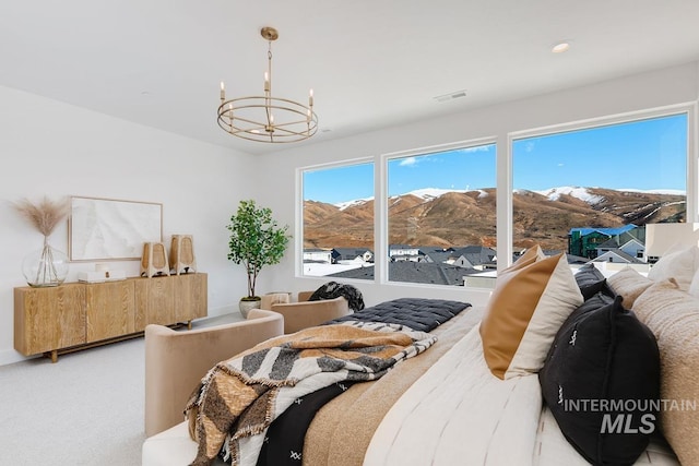 bedroom with recessed lighting, visible vents, a notable chandelier, and light colored carpet