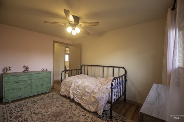 104 Friendship Ln, Council, ID 83612 - bedroom with wood finished floors and a ceiling fan