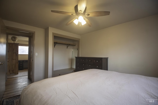 104 Friendship Ln, Council, ID 83612 - bedroom with wood finished floors, a closet, and ceiling fan