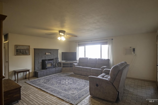 104 Friendship Ln, Council, ID 83612 - living area featuring a wall mounted AC, a ceiling fan, and brick patterned floors