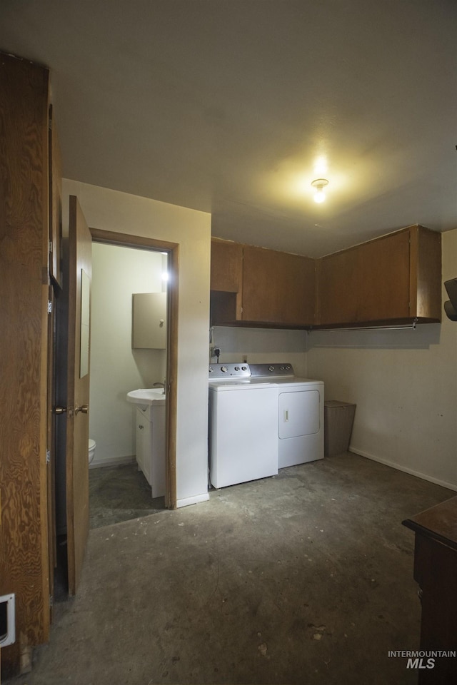 104 Friendship Ln, Council, ID 83612 - washroom with cabinet space and washer and dryer