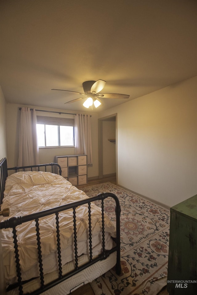 104 Friendship Ln, Council, ID 83612 - bedroom featuring a ceiling fan and carpet