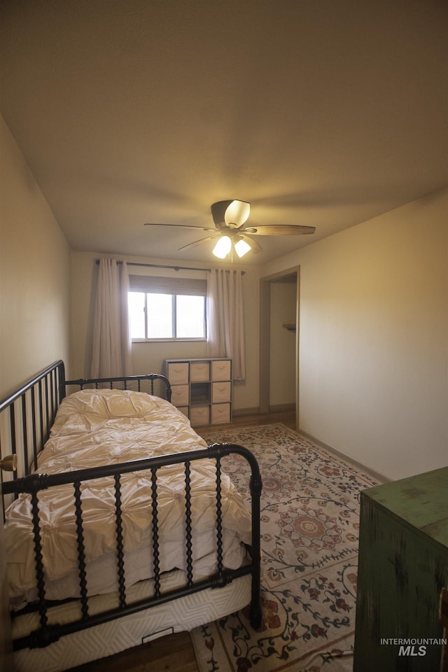 104 Friendship Ln, Council, ID 83612 - bedroom with ceiling fan and baseboards