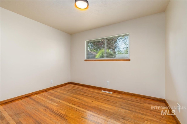 empty room featuring light hardwood / wood-style flooring