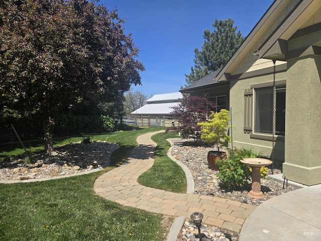 view of yard with fence