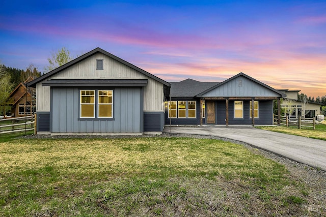 1112 Mos Way, Mccall, ID 83638 - view of front of home featuring asphalt driveway and board and batten siding