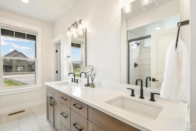 1112 Mos Way, Mccall, ID 83638 - bathroom featuring plenty of natural light, double vanity, a shower stall, tile patterned floors, and recessed lighting